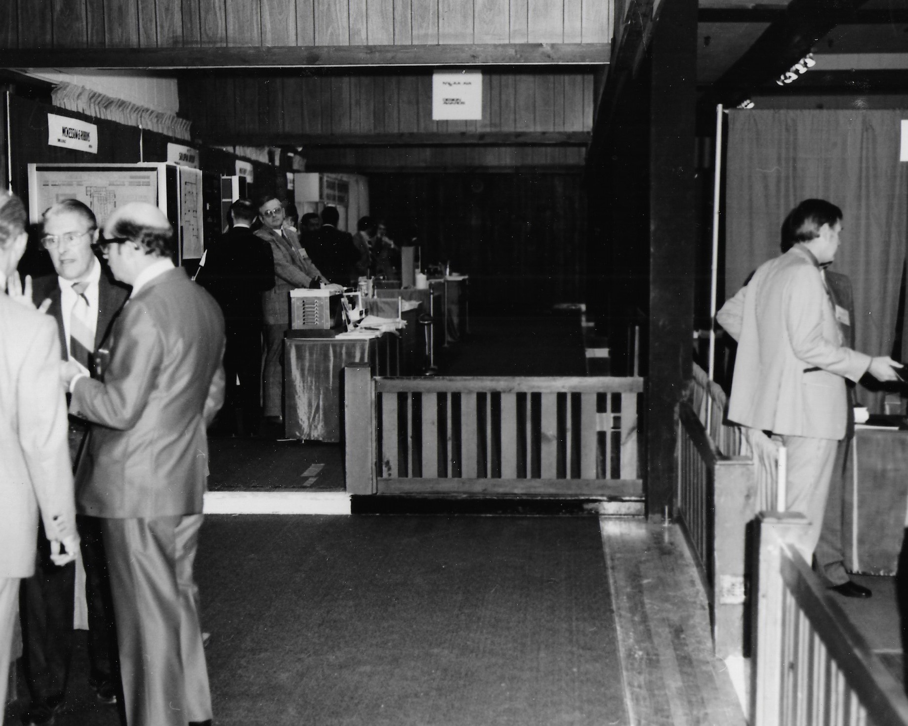 Several Conversations Happening on Exhibit Floor