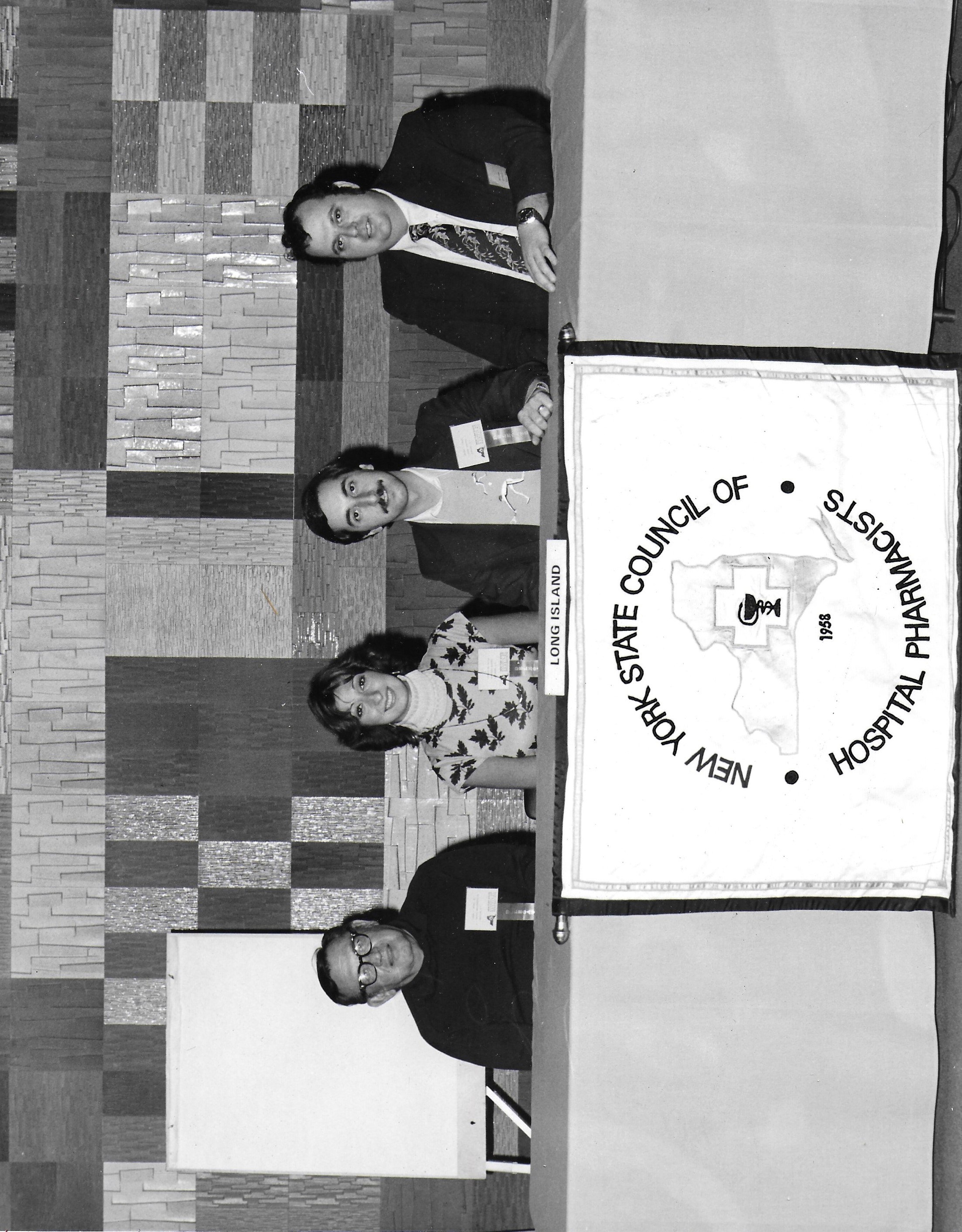 Long Island Delegates of 1977 Sitting  at a table