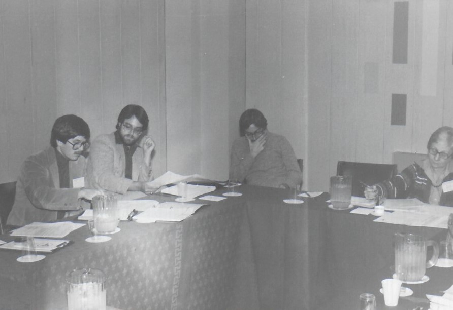 Board meeting with members at the table