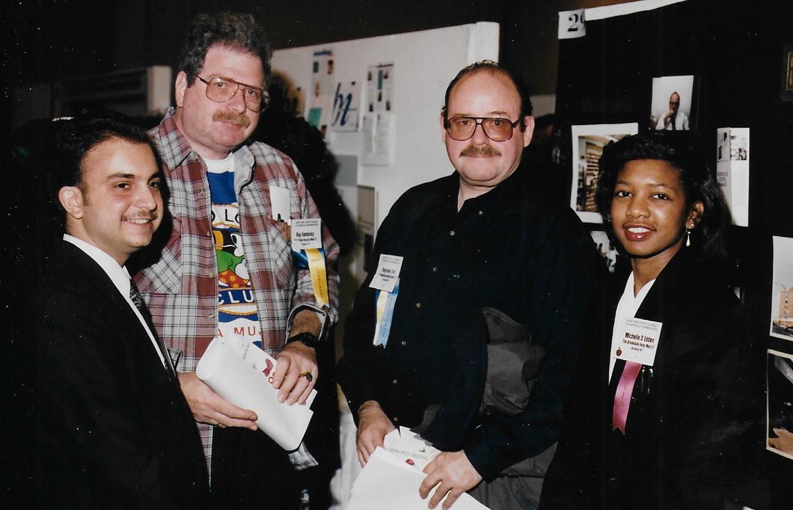 Standing Near a Booth at Exhibits