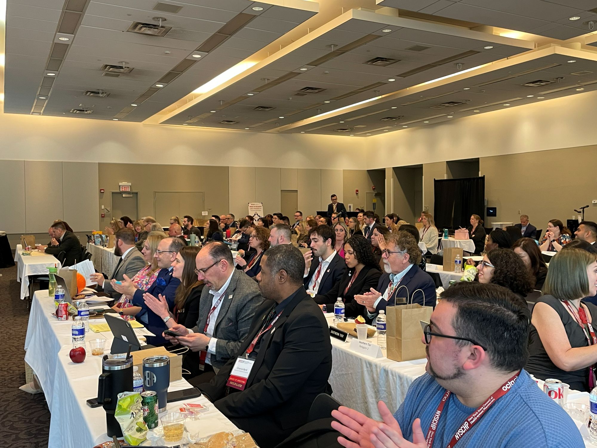 Hall of Delegates with everyone sitting at tables